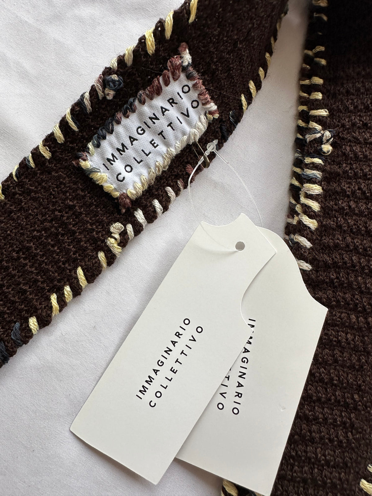 Embroidered knitted tie