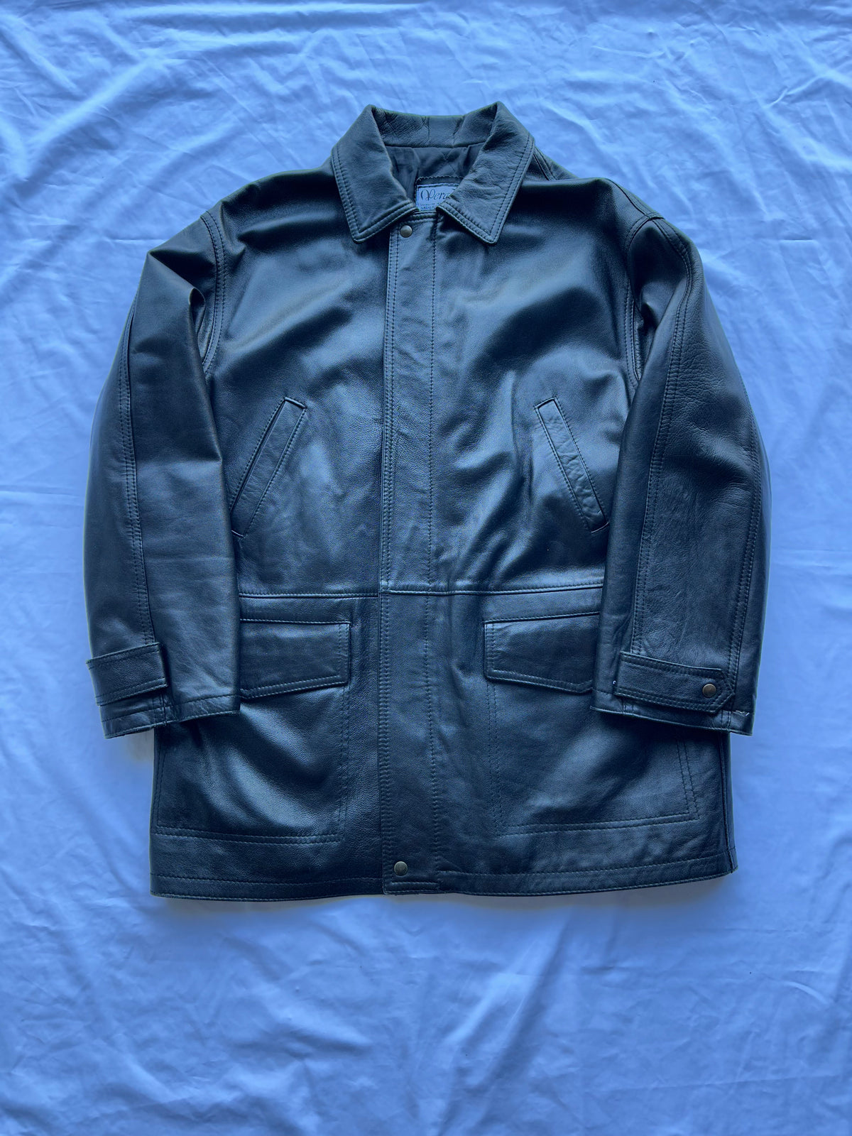 Trench in pelle