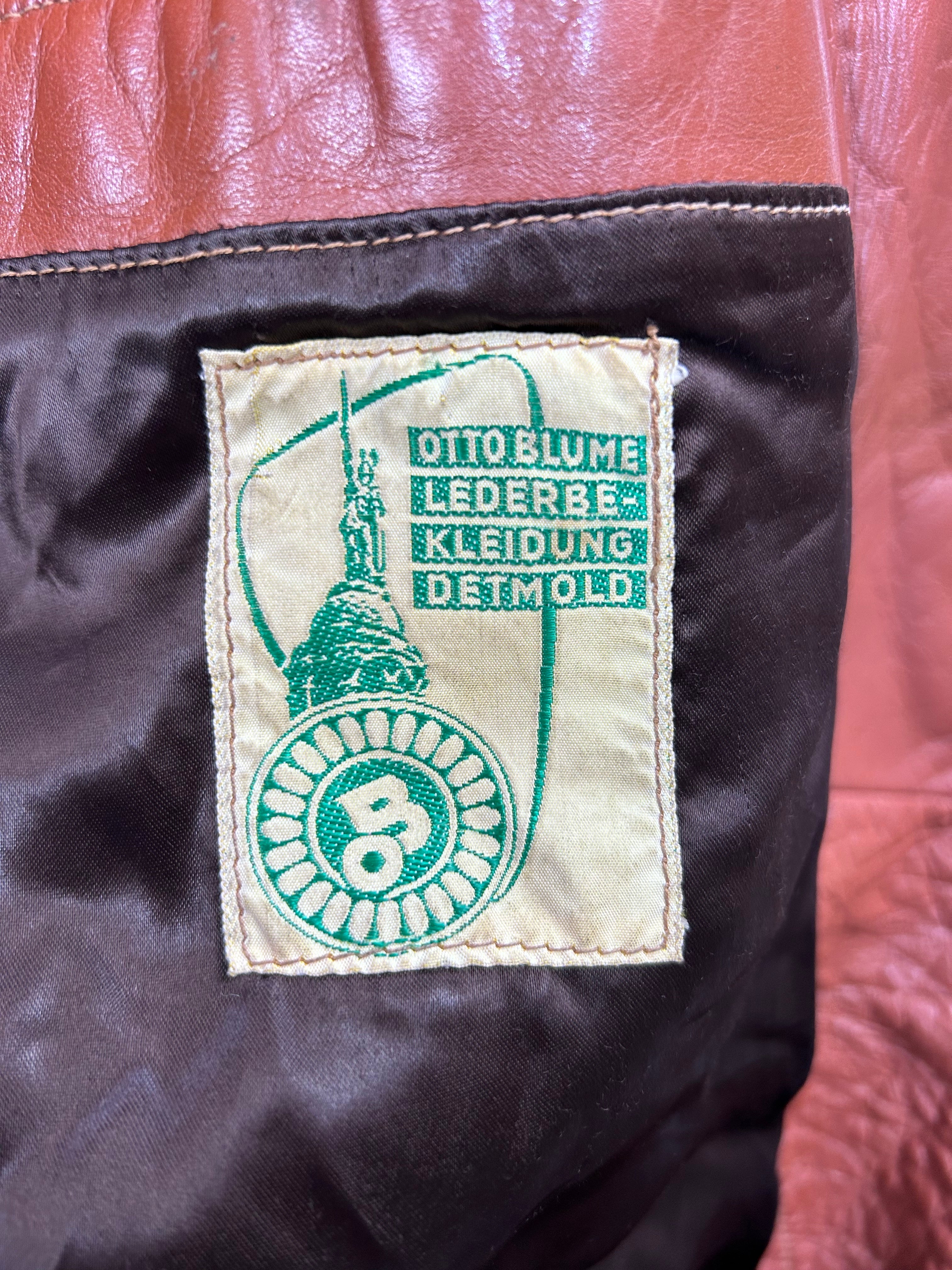 Trench in pelle
