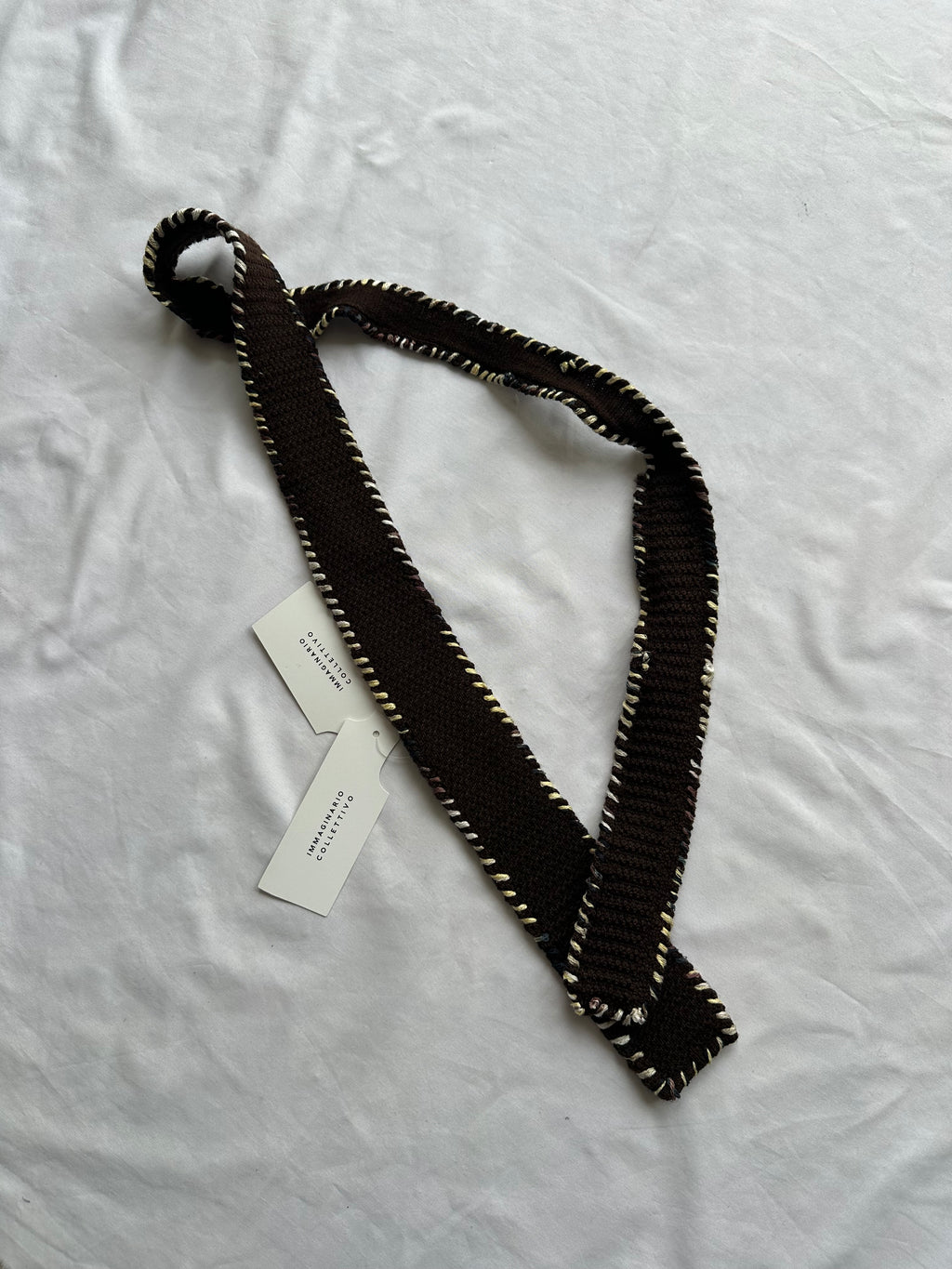 Embroidered knitted tie