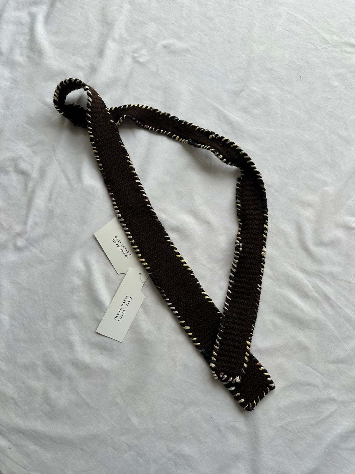Embroidered knitted tie