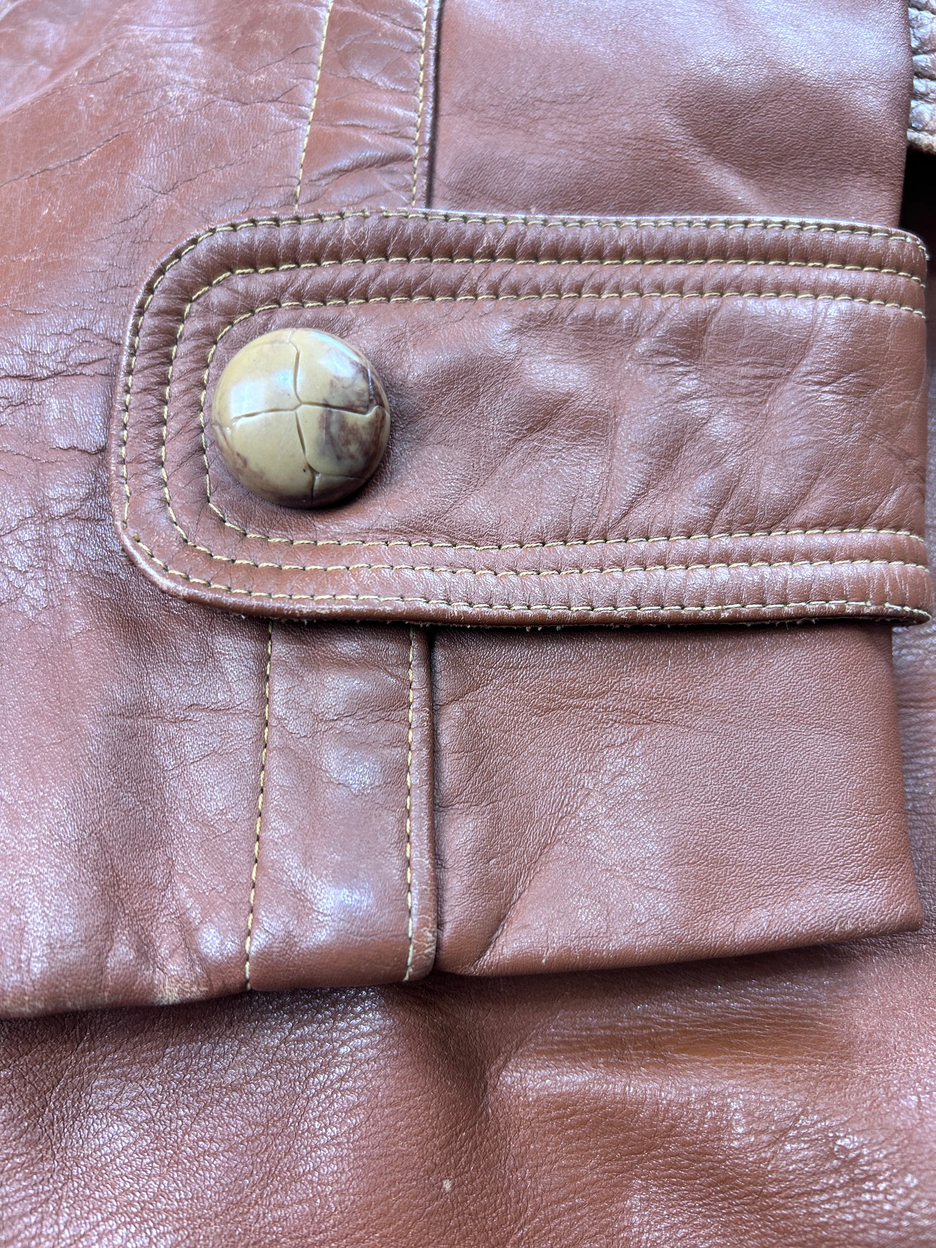 Trench in pelle