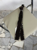 Embroidered knitted tie