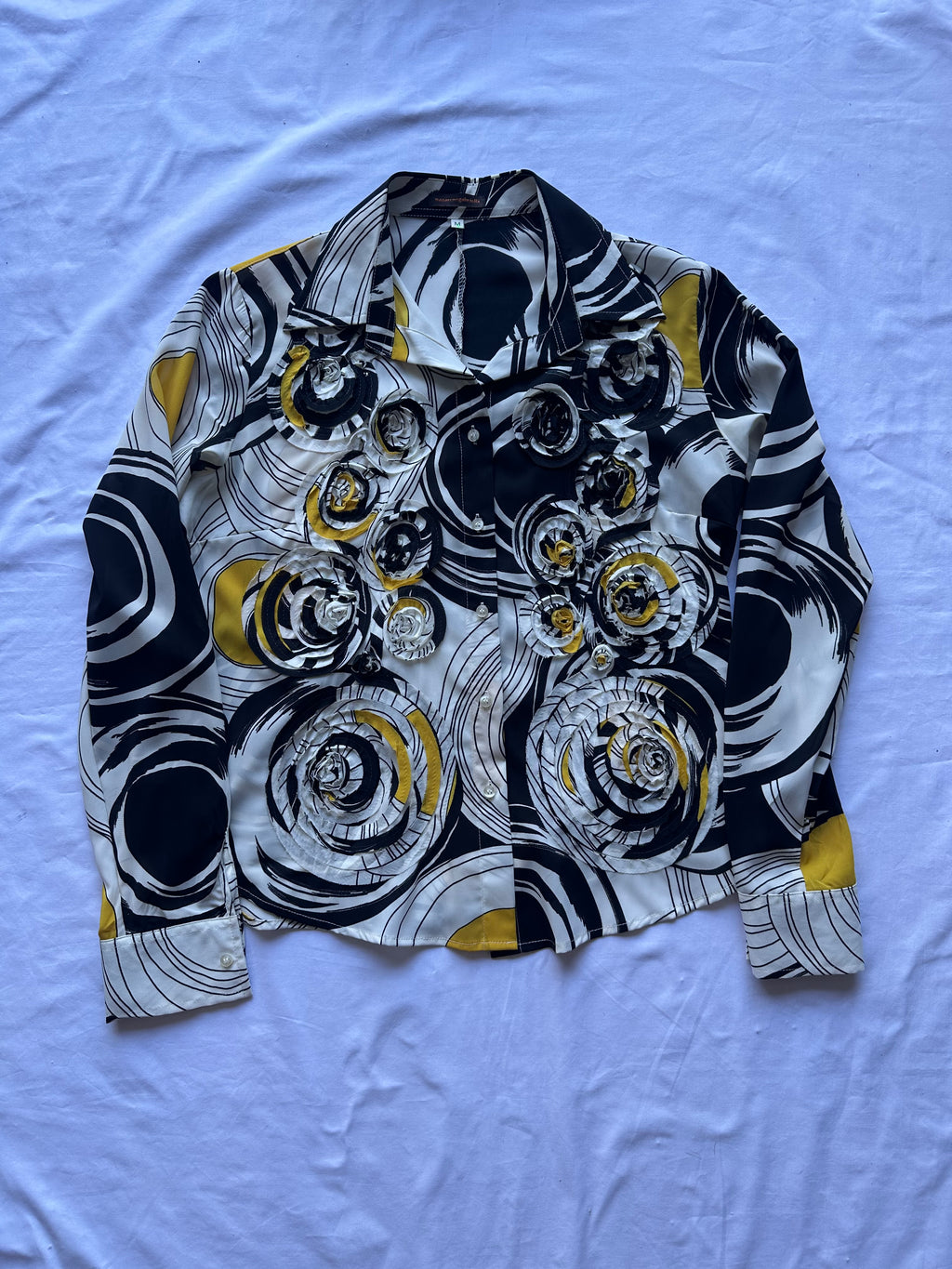 Camicia fiori a rilievo